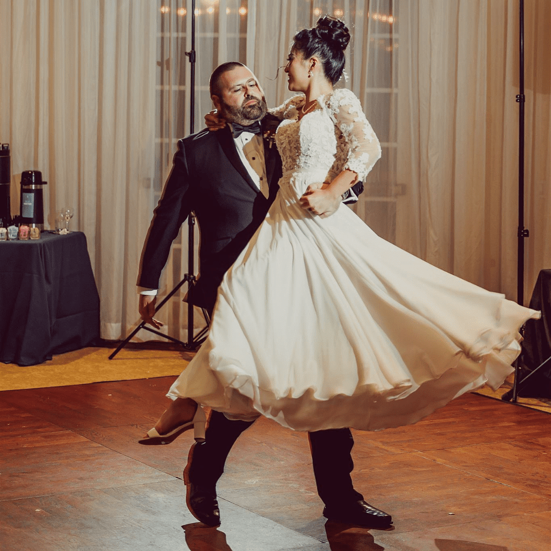 PNW Wedding Dance - PNW Weddings - Choreographer Entertainment - Oregon Washington Idaho - Dancing Lift Ball Gown Appliqués Chiffon Draping DJ Dance Floor Balck Suit And Tie Pearl Earrings-min PDX Flash Mob
