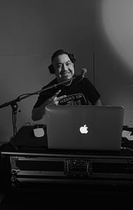 DJ Addy - PNW Weddings - DJ - Oregon Washington Idaho - Black And White Mac Microphone Peace Sign Headphones Music DJ Table-min