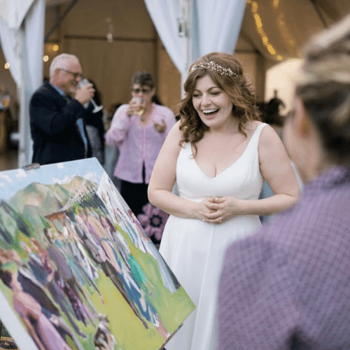 Celebration Paintings - PNW Weddings Live Wedding Painter Outdoor Delighted Bride-min 3 Birds Caravan - Mobile Bridal Suite - Two Candles-min