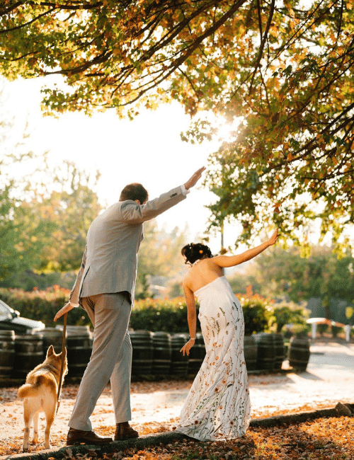 Orcas Photo & Video - PNW Weddings - Playful Couple With Dog-min 3 Birds Caravan - Mobile Bridal Suite - Two Candles-min