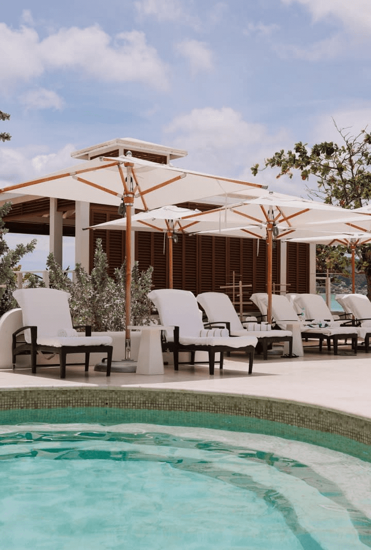 PNW Weddings-poolside honeymoon villas booked by travel agent-min