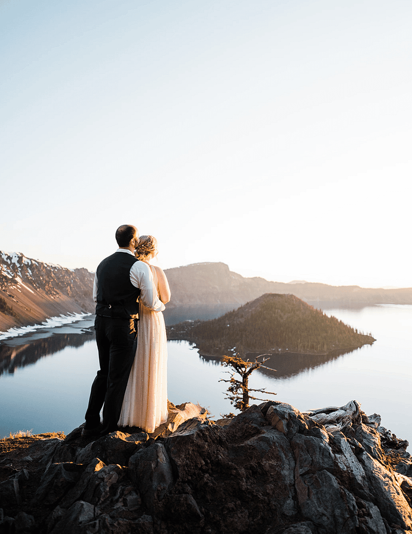 Wedding Couple Portrait Standing By Crater Lake Oregon Taken By Sam Starns PNW Wedding Wedding Couple Portrait Standing By Crater Lake Oregon Taken By Sam Starns PNW Wedding